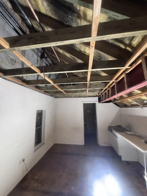 Controlled artex plasterboard strip-out in Dalston