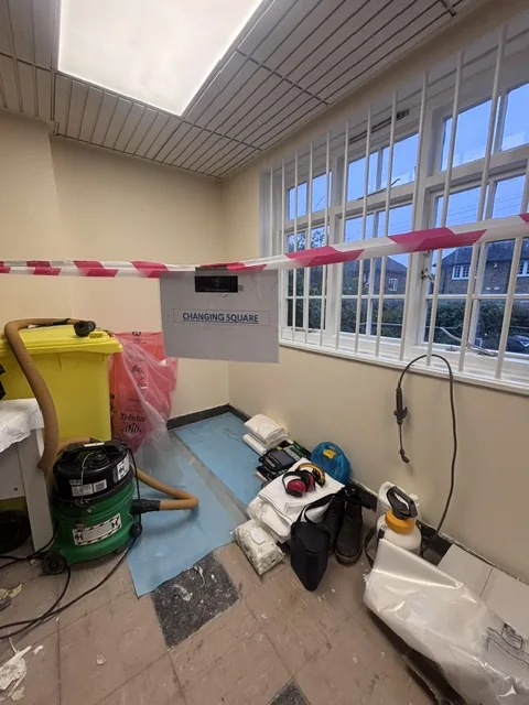 Asbestos floor tile and bitumen removal in Dalston